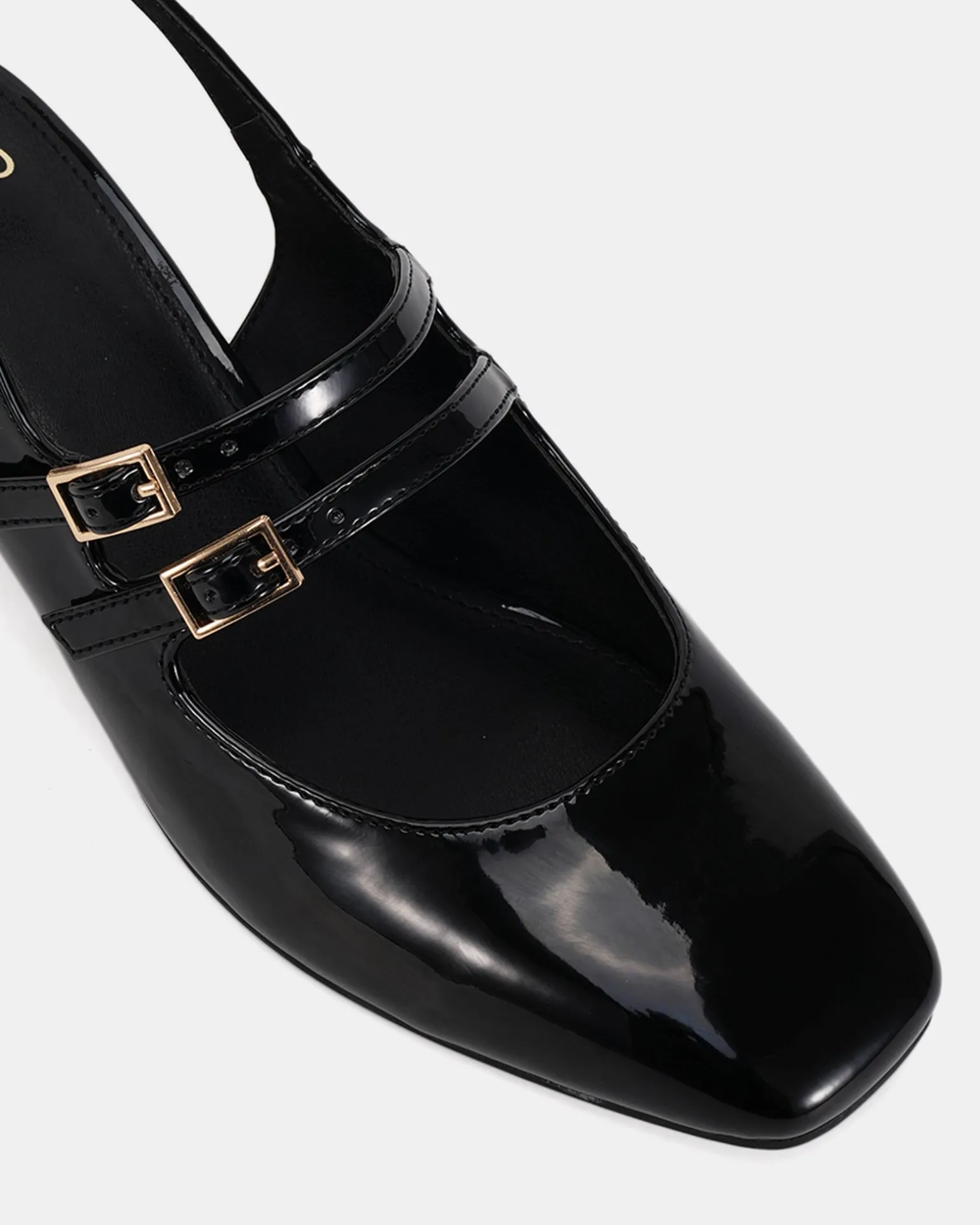 CHIMEZIE Black Patent Pumps
