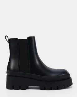 DOMINIQUE BLACK Slip On Boots