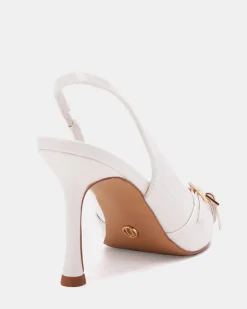 IGGI White Patent Pumps