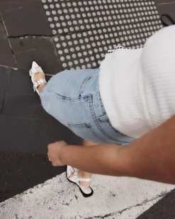 ZIMBI White Patent Slip Ons